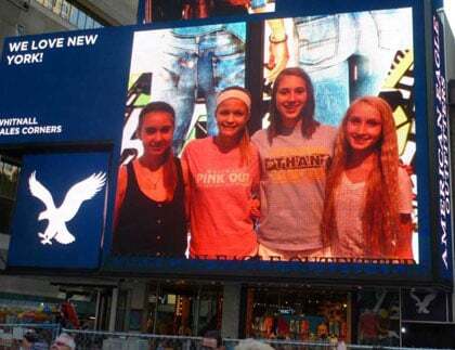 Students on Billboard in NYC
