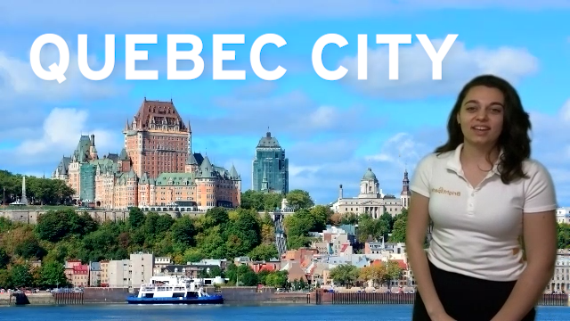 Brightspark Tour Leader Tamara stands in front of a photo of Quebec City Skyline on a virtual tour