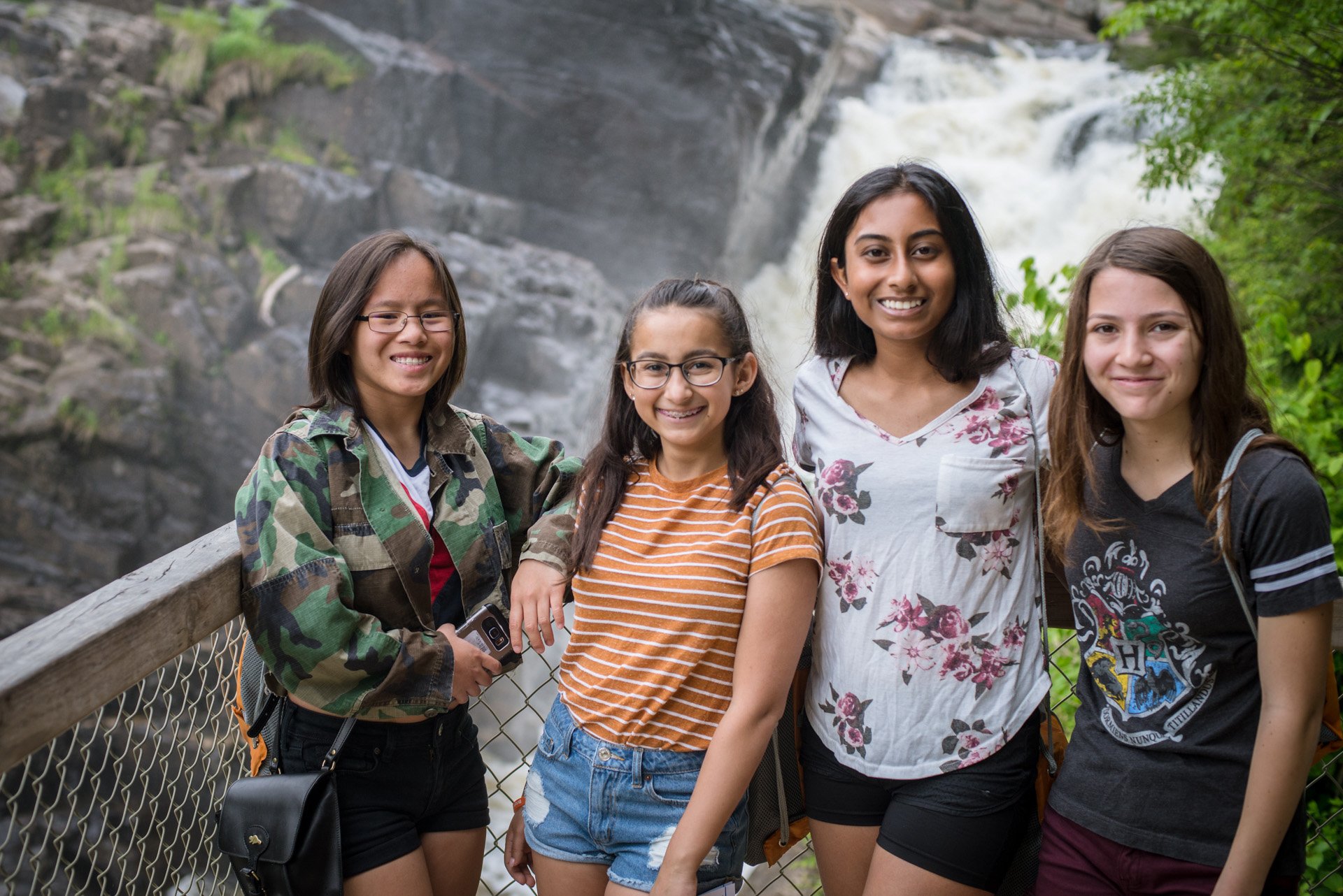 Four girls take a photo at Canyon St-Anne in QC