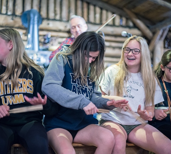 students laughing sitting down