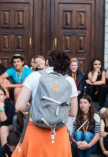 tour guide speaking to students