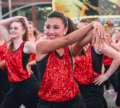 student dancers performing live at Times Square in NYC for Dance The World Broadway